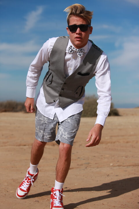 Kacen Horner in Desert with Shorts and Vest with Shades